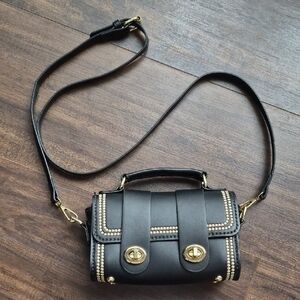 Elegant Black Mini Bag with Gold Details